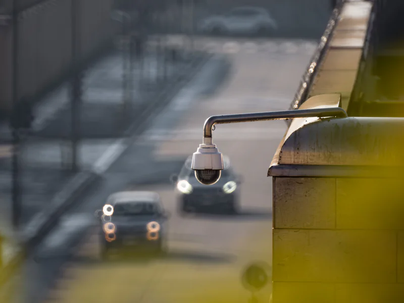 Roadside traffic sensor pole where height, angle, lane geometry, and occlusion determine radar coverage