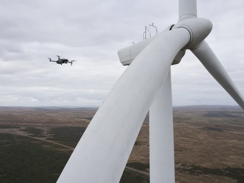 Drone maintaining a safe stand-off from a wind-turbine blade during repeatable aerial inspection