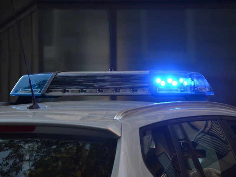 Emergency vehicle warning lights illustrating the downstream operator and responder workflow triggered by a confirmed wrong-way event